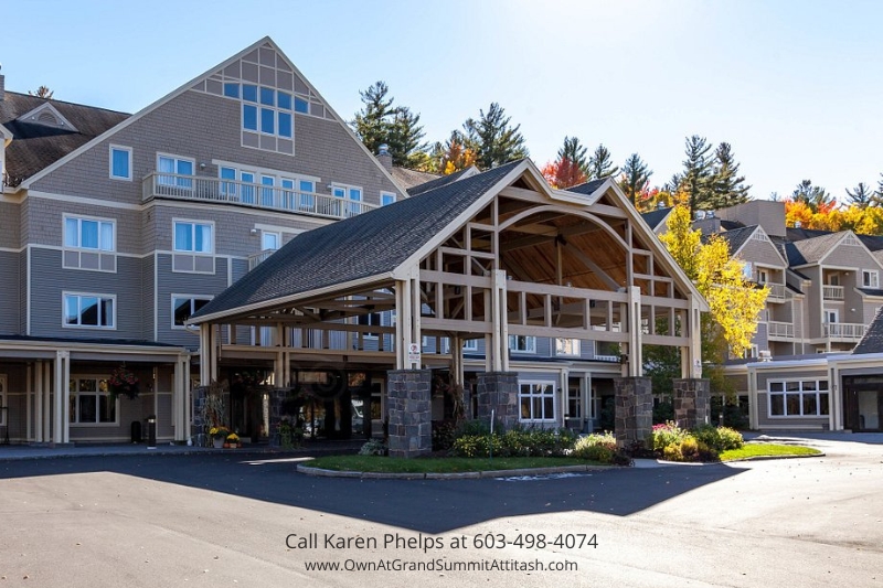 Grand Summit Hotel front entrance with covered wooden portico and stone columns, the welcoming arrival point for Unit 149 Interval 3