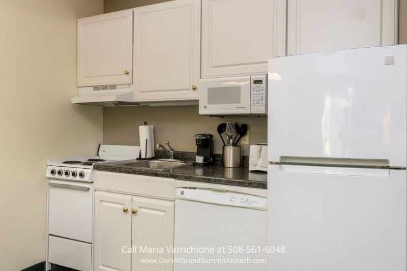 Fully equipped kitchen in Unit 337 Interval 3 at the Grand Summit Hotel, offering modern appliances, ample counter space, and a comfortable environment for cooking